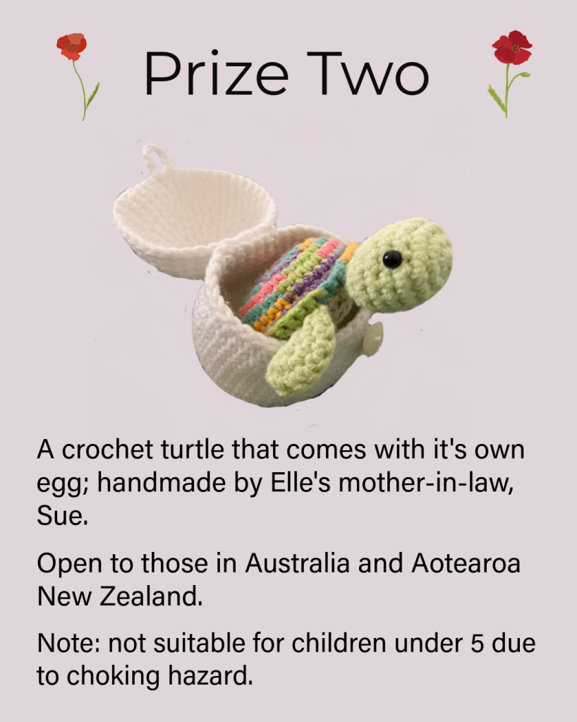 A photo of a crochet turtle that is sitting in a crocheted egg. Text: Prize Two: A crochet turtle that comes with it's own egg; handmade by Elle's mother-in-law, Sue. Open to those in Australia and Aotearoa New Zealand. Note: not suitable for children under 5 due to choking hazard."